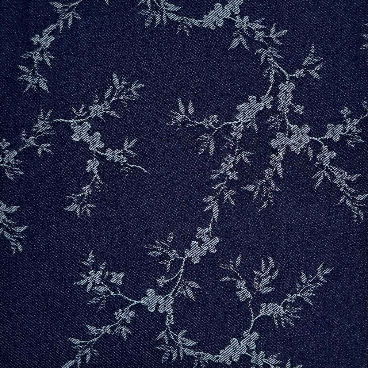 Denim med vævede blomsterranker i marineblå
