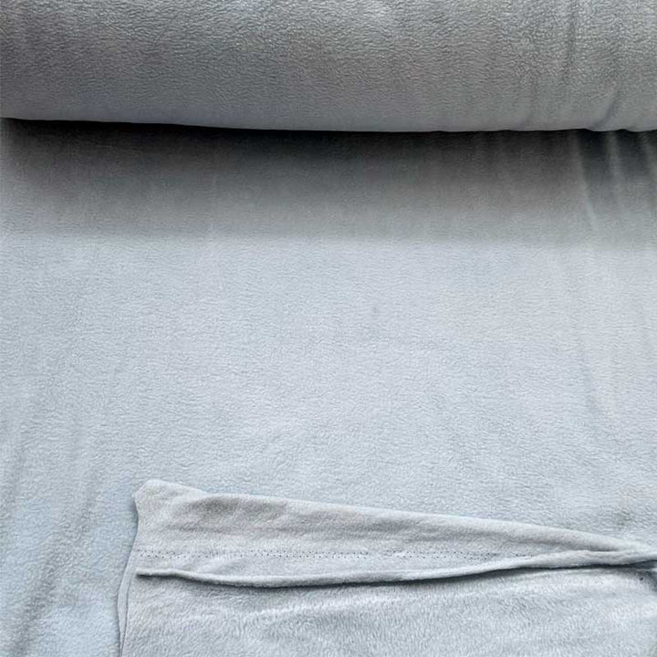 Fleece stof i lyseblå