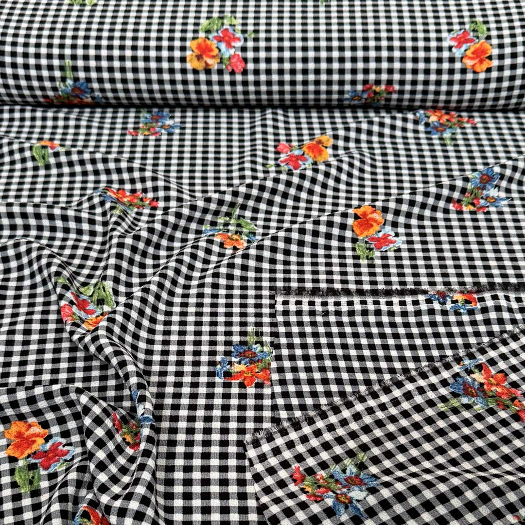 Ternet metervare med blomsterprint