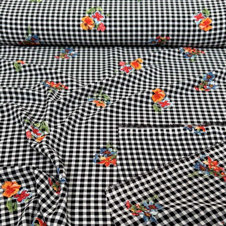 Ternet metervare med blomsterprint