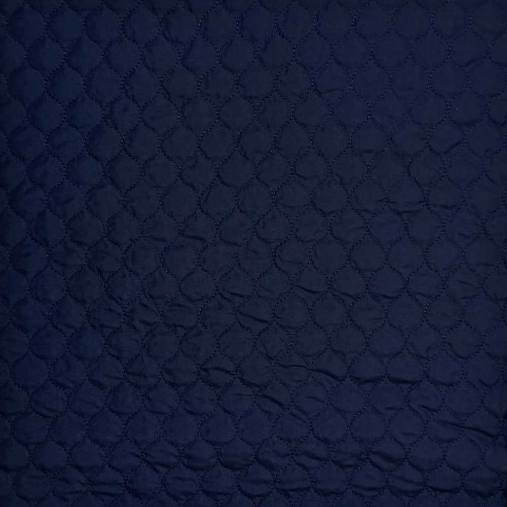 Quilt i små felter marine