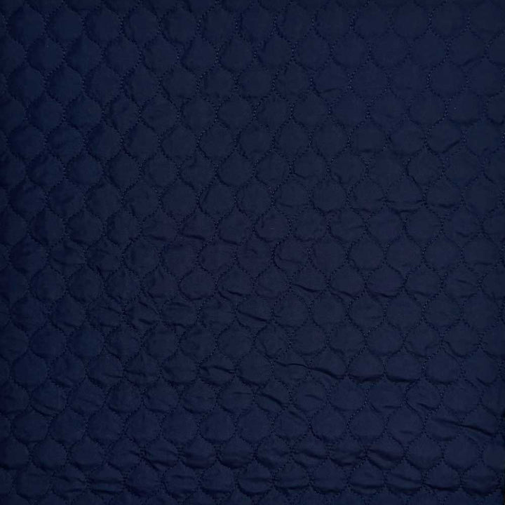 Quilt i små felter marine