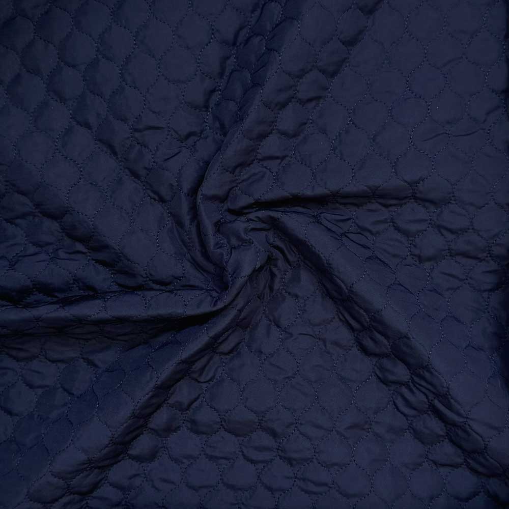 Quilt i små felter marine