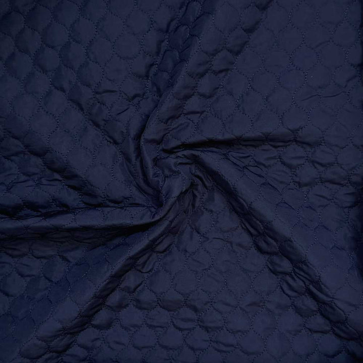 Quilt i små felter marine