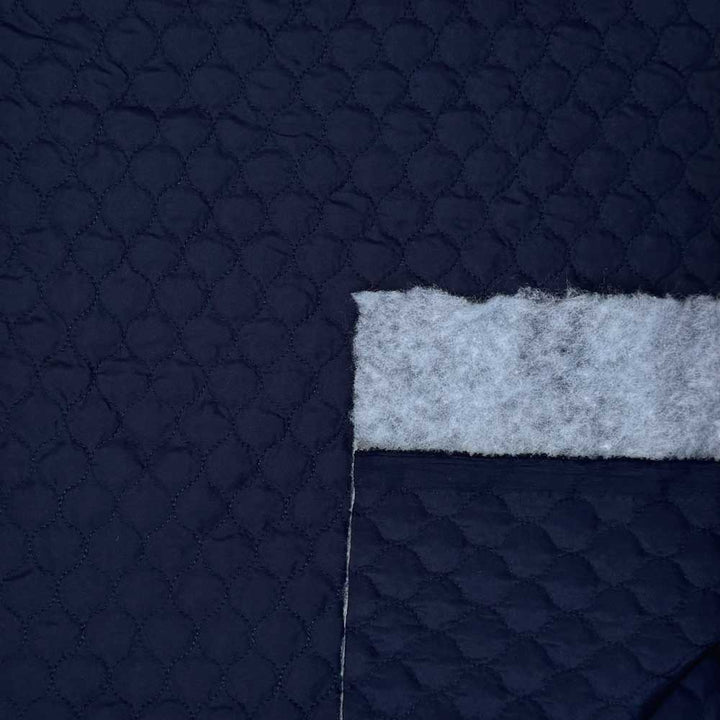 Quilt i små felter marine