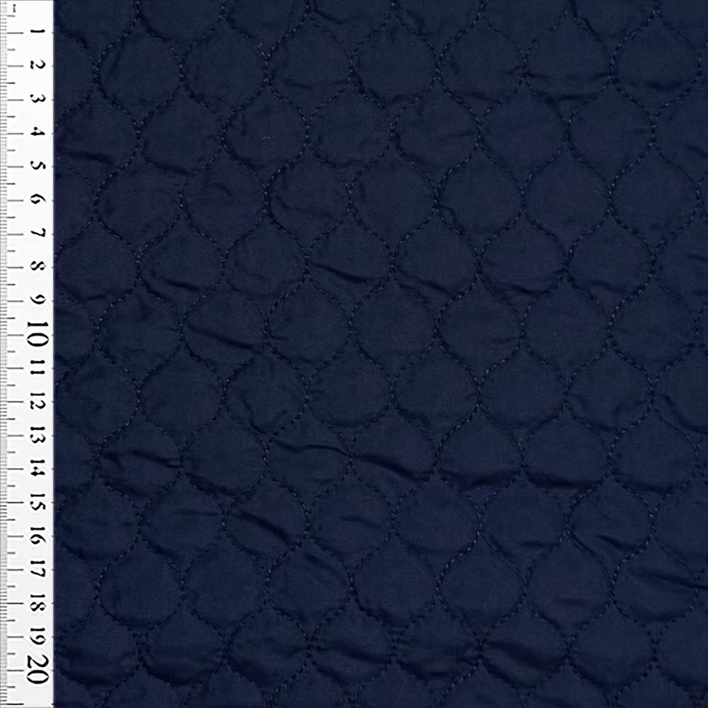 Quilt i små felter marine