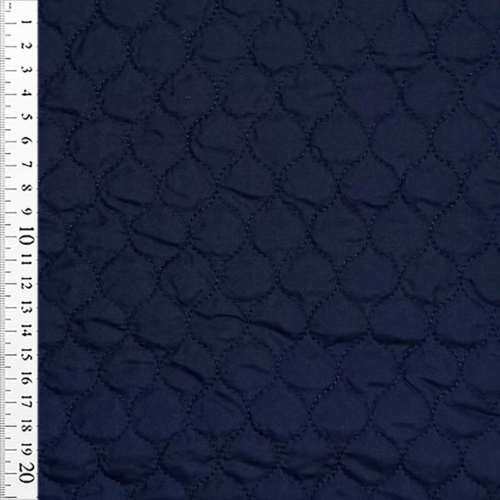 Quilt i små felter marine