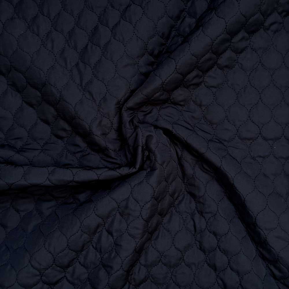 Quilt i små felter sort
