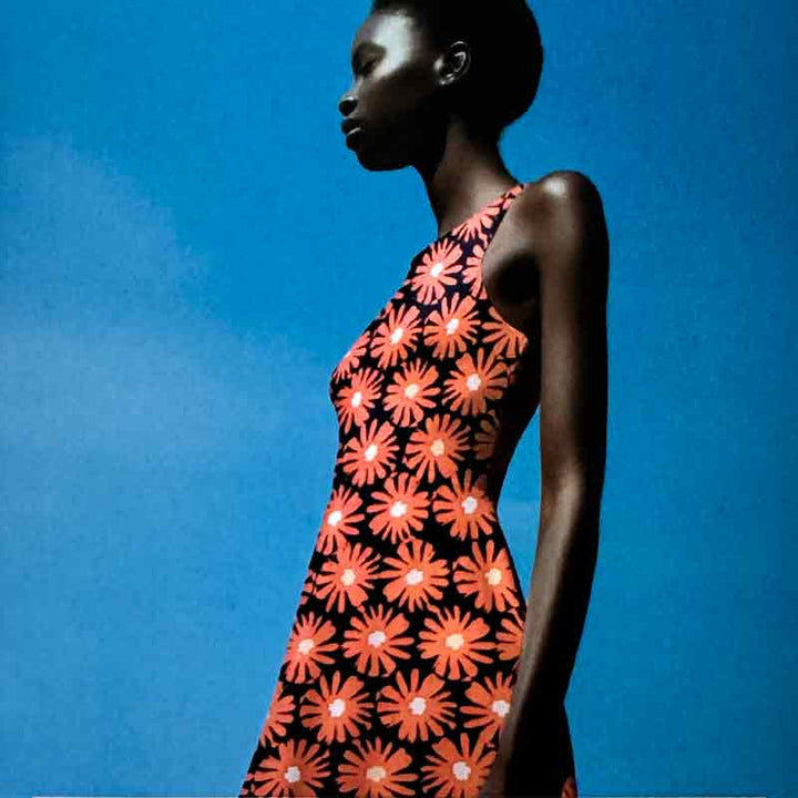 Fast viscose med orange motiv blomst fra Light and Lush