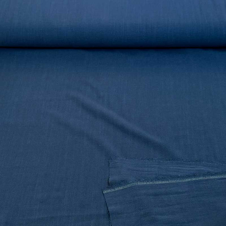 Ensfarvet fast viscose / hør i blå