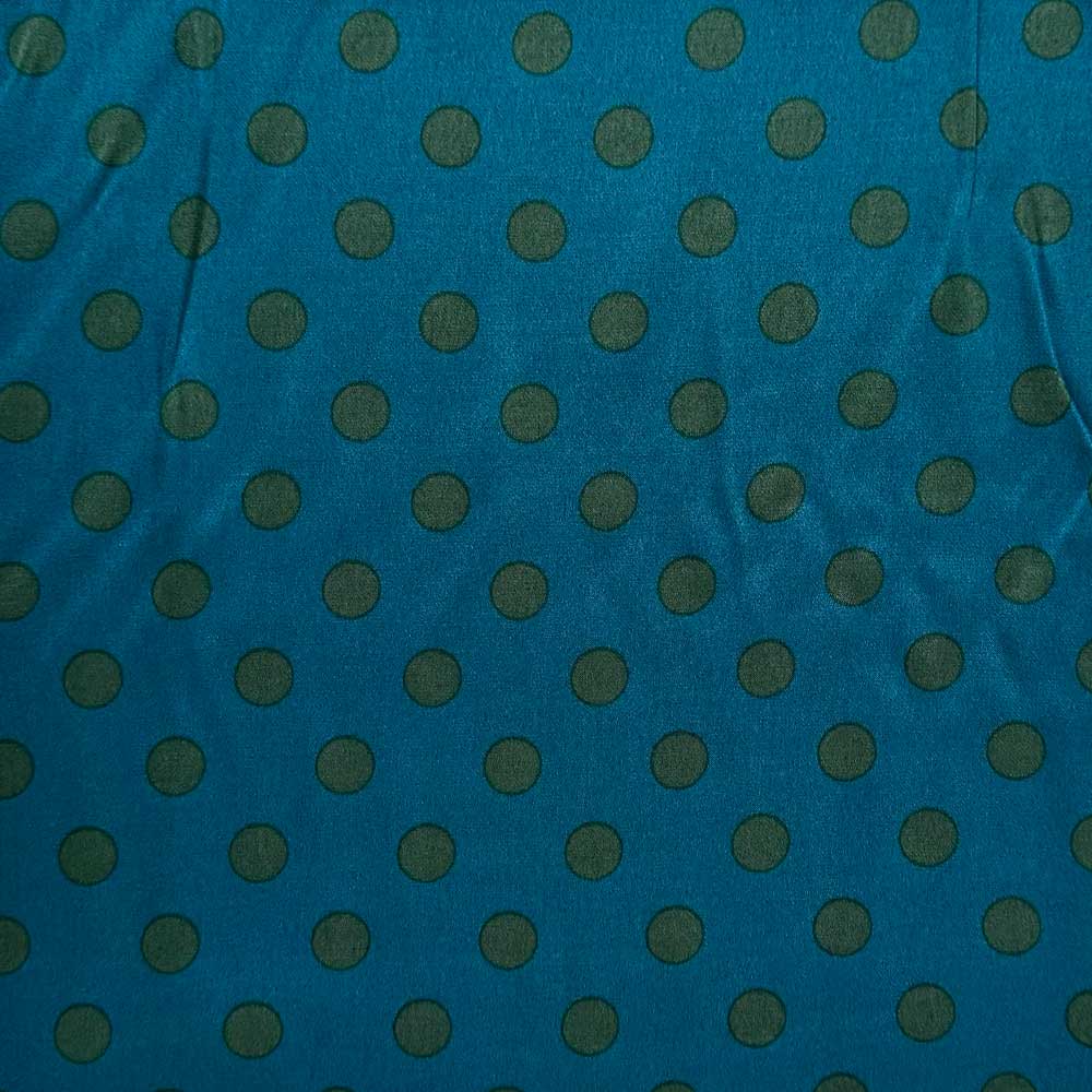 Fast viscose satin med grønne prikker på petrol bund