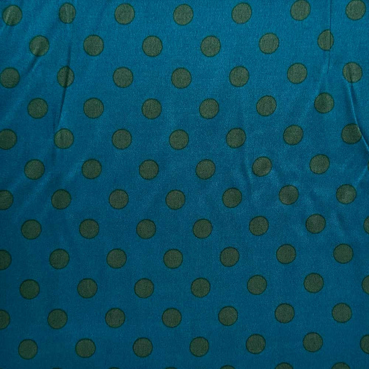 Fast viscose satin med grønne prikker på petrol bund