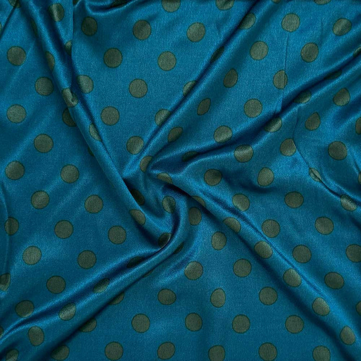 Fast viscose satin med grønne prikker på petrol bund