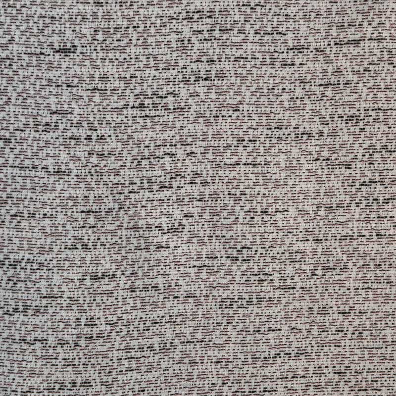 Fastvævet vare med sort og pink vævninger