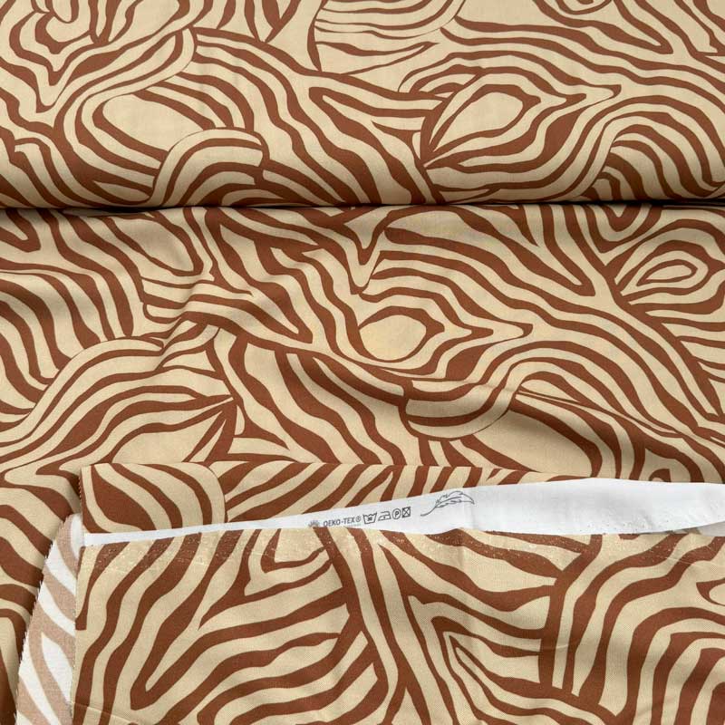 Fast viscose med abstrakt zebra print i gylden farver