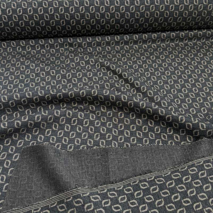 Vinter jersey med geometriske felter i beige på grå bund