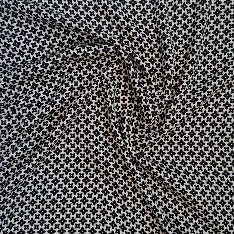 Fast viscose med små blomster i sort