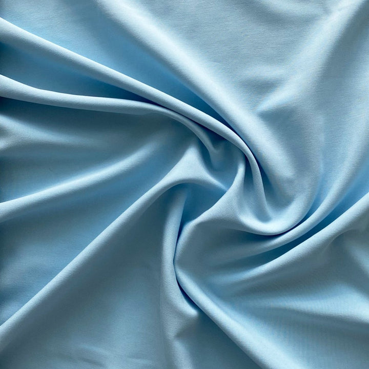 Ensfarvet fast viscose med lidt stræk lyseblå
