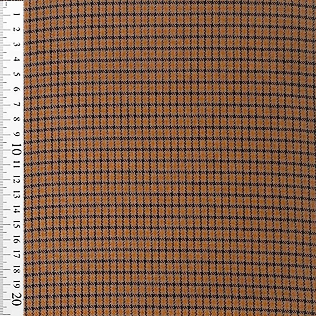 Fastvævet vare med tern orange/sort