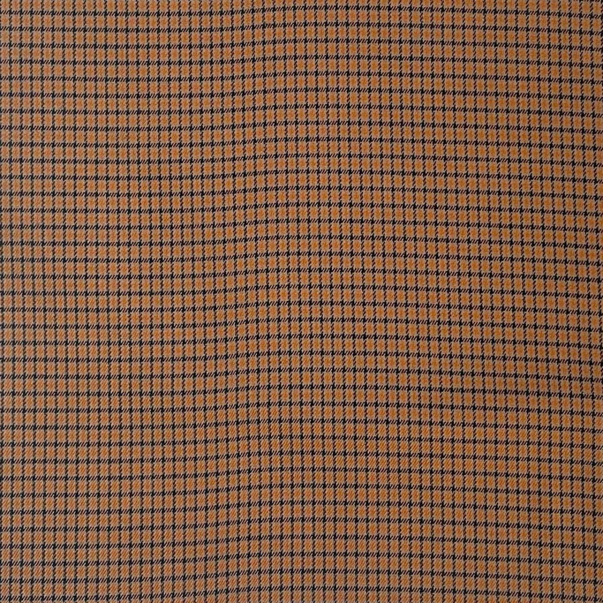 Fastvævet vare med tern orange/sort